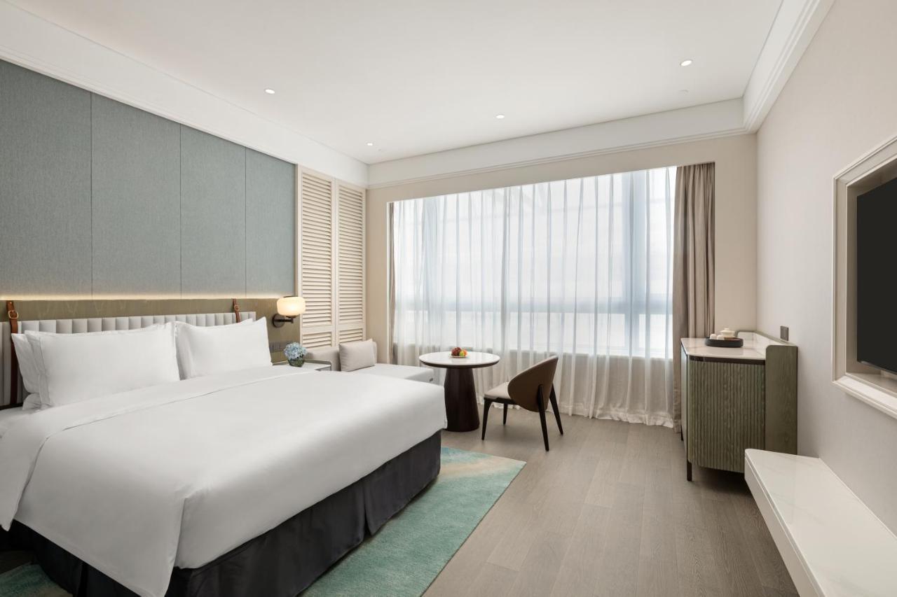 Xiamen International Seaside Hotel -Hotel Corridor Leads To The Stone Exhibition Hall Ngoại thất bức ảnh