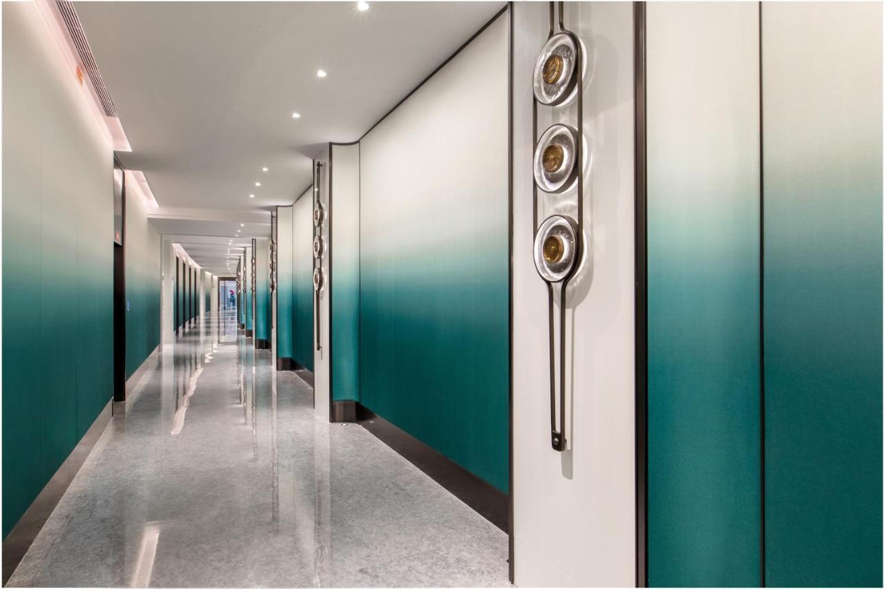 Xiamen International Seaside Hotel -Hotel Corridor Leads To The Stone Exhibition Hall Ngoại thất bức ảnh