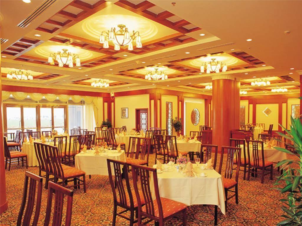 Xiamen International Seaside Hotel -Hotel Corridor Leads To The Stone Exhibition Hall Ngoại thất bức ảnh